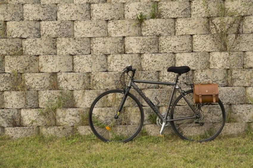 Hybrid bike against wall